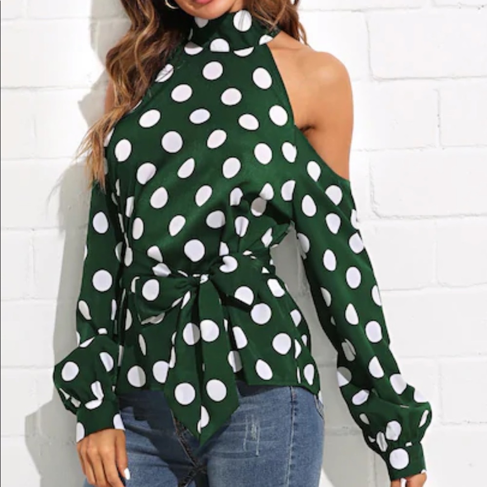 Green and white polka dot blouse